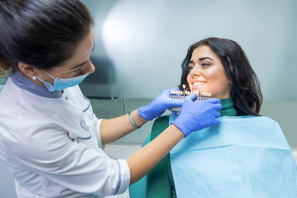 Woman at dentist preparing for her dental implant surgery