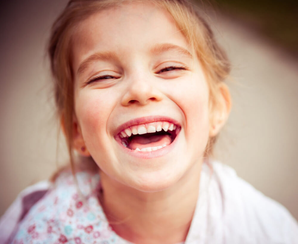 Child smiling at camera