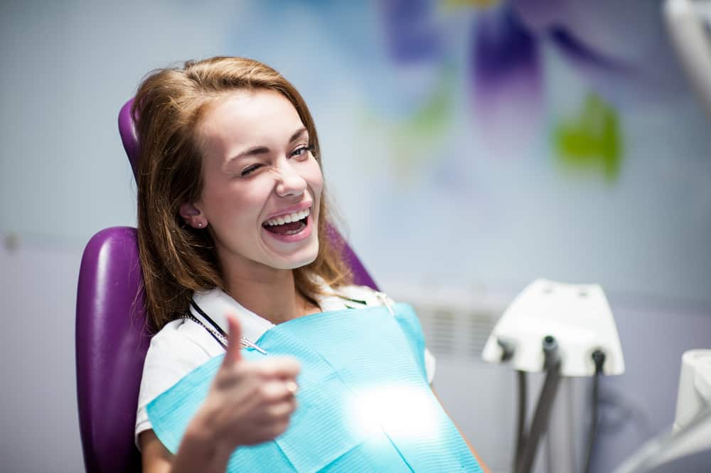 Woman receiving general dentistry advice