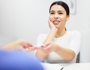 Woman in Pain from a Tooth